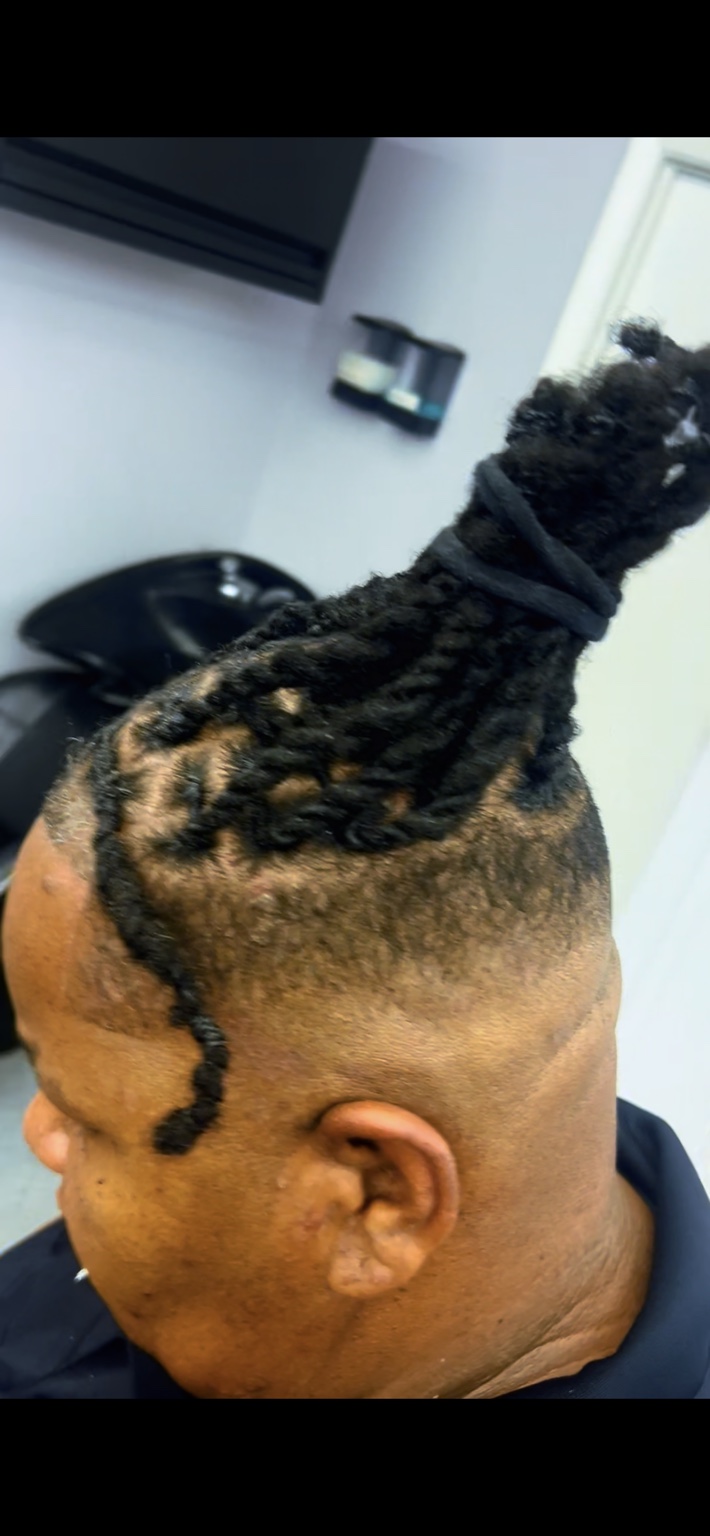 Styled locs with red ends
